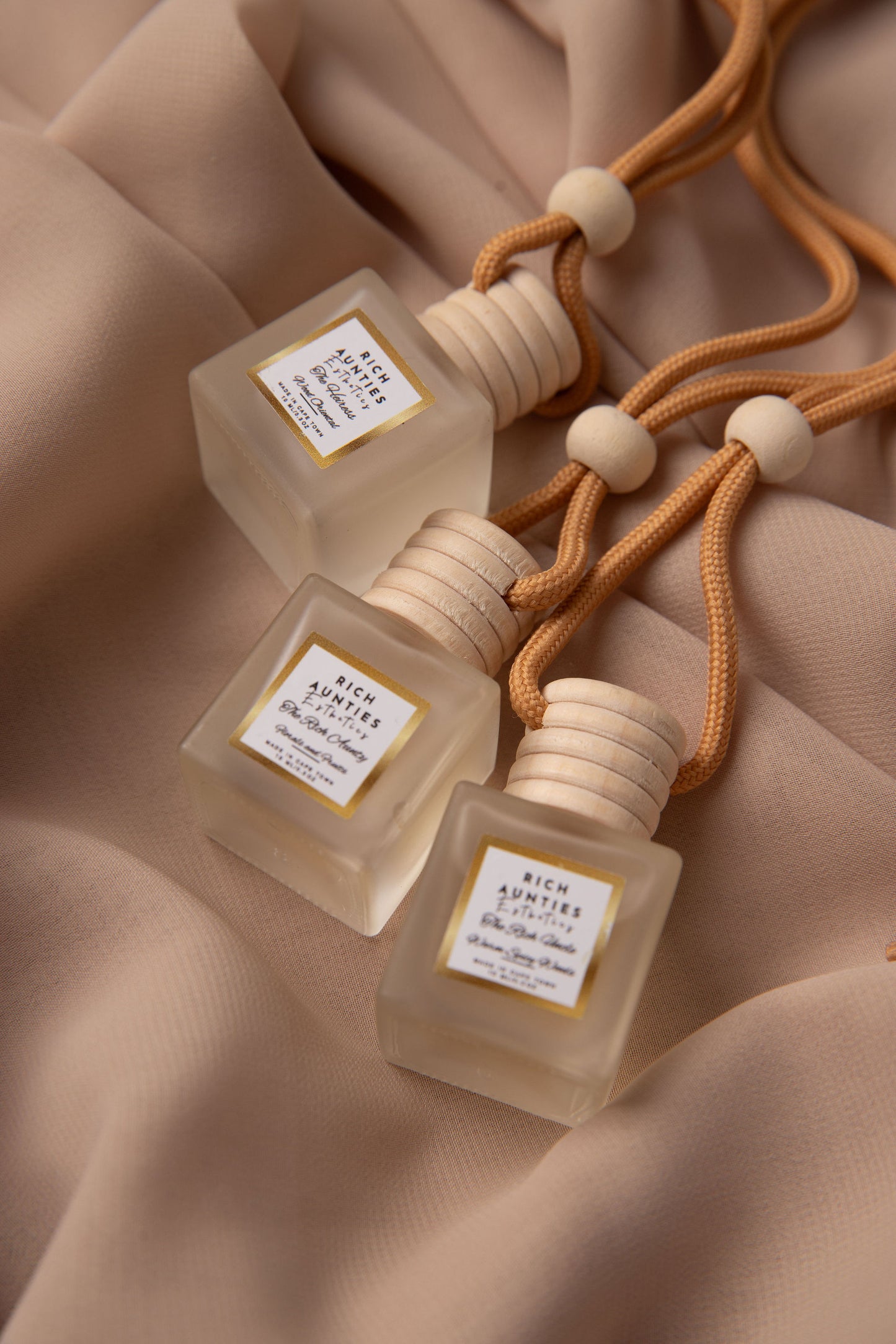 Shop the Luxury Car Diffuser Collection by Rich Aunties Esthetics. Three signature 10ml travel fragrances handcrafted in Cape Town to elevate your drive.