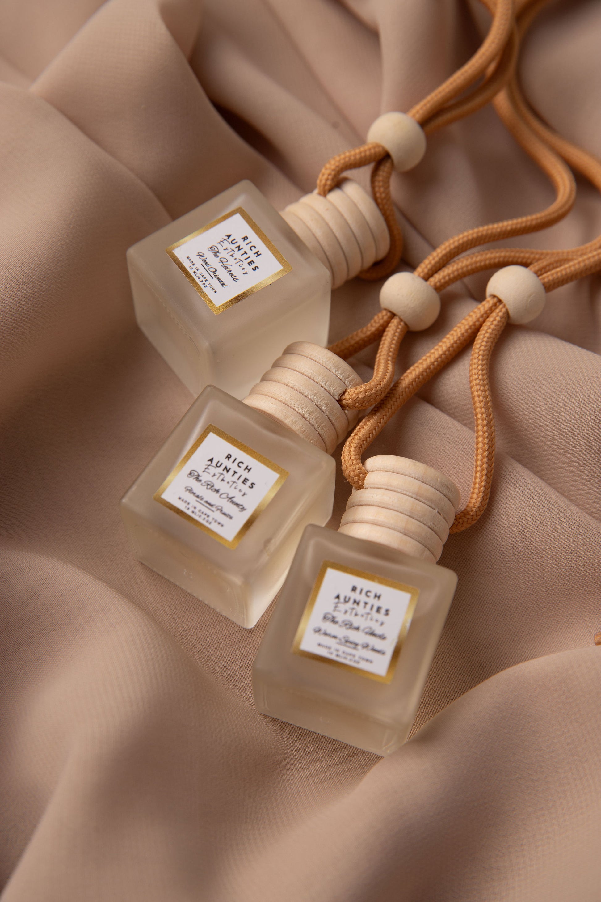 Shop the Luxury Car Diffuser Collection by Rich Aunties Esthetics. Three signature 10ml travel fragrances handcrafted in Cape Town to elevate your drive.
