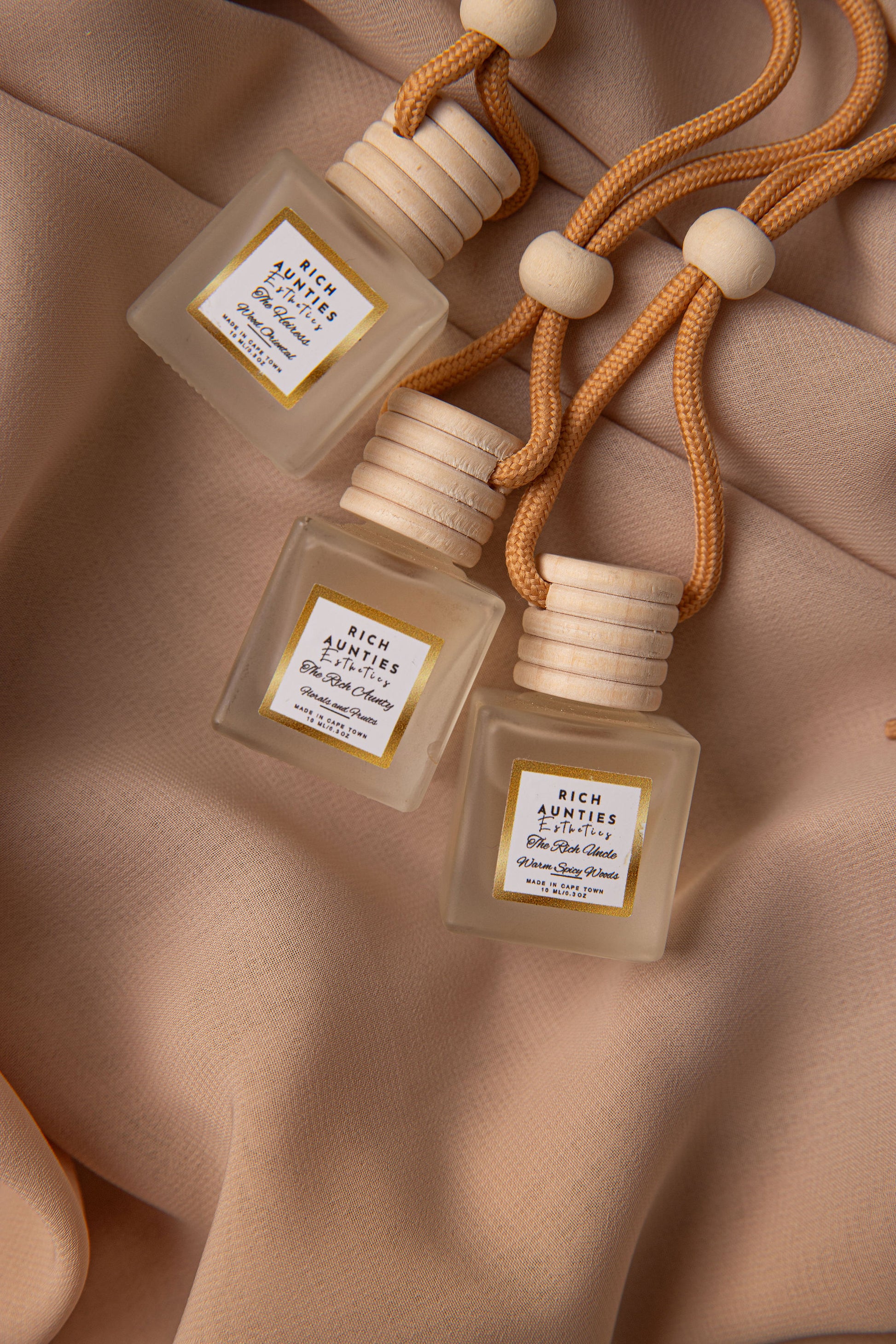 Shop the Luxury Car Diffuser Collection by Rich Aunties Esthetics. Three signature 10ml travel fragrances handcrafted in Cape Town to elevate your drive.