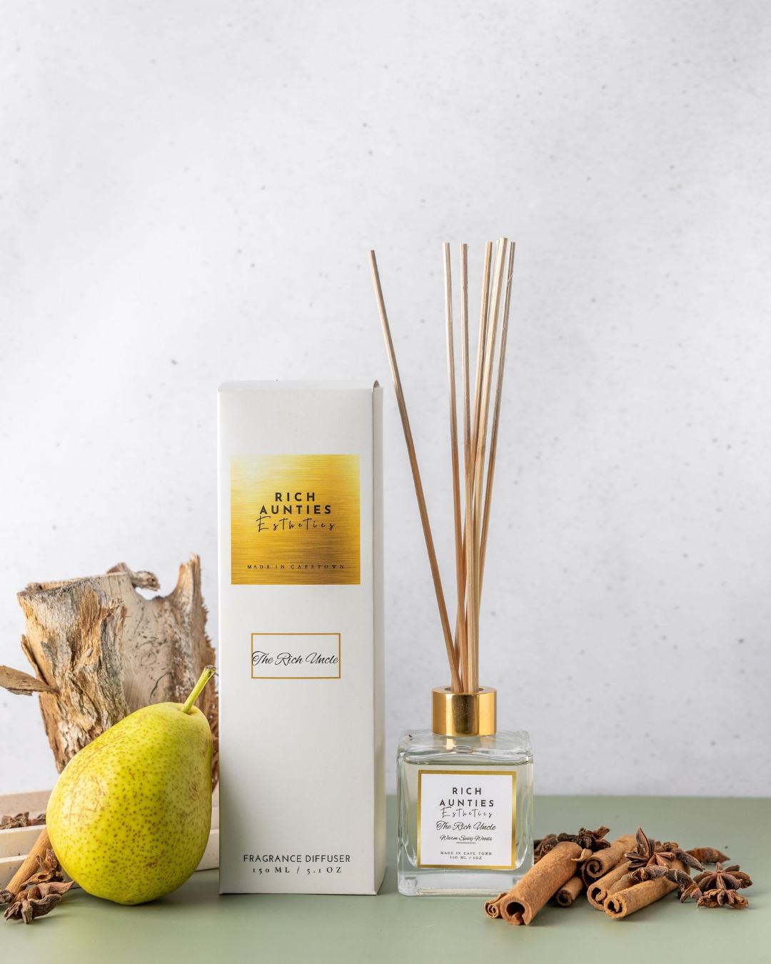 Rich Aunties Esthetics premium 150ml citrus and spice reed diffuser in a square glass bottle with natural reeds and luxury soft touch box